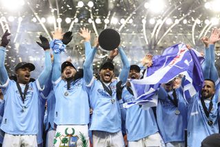 New York City FC players celebrate after beating Portland Timbers on penalties to win the MLS Cup in December 2021.