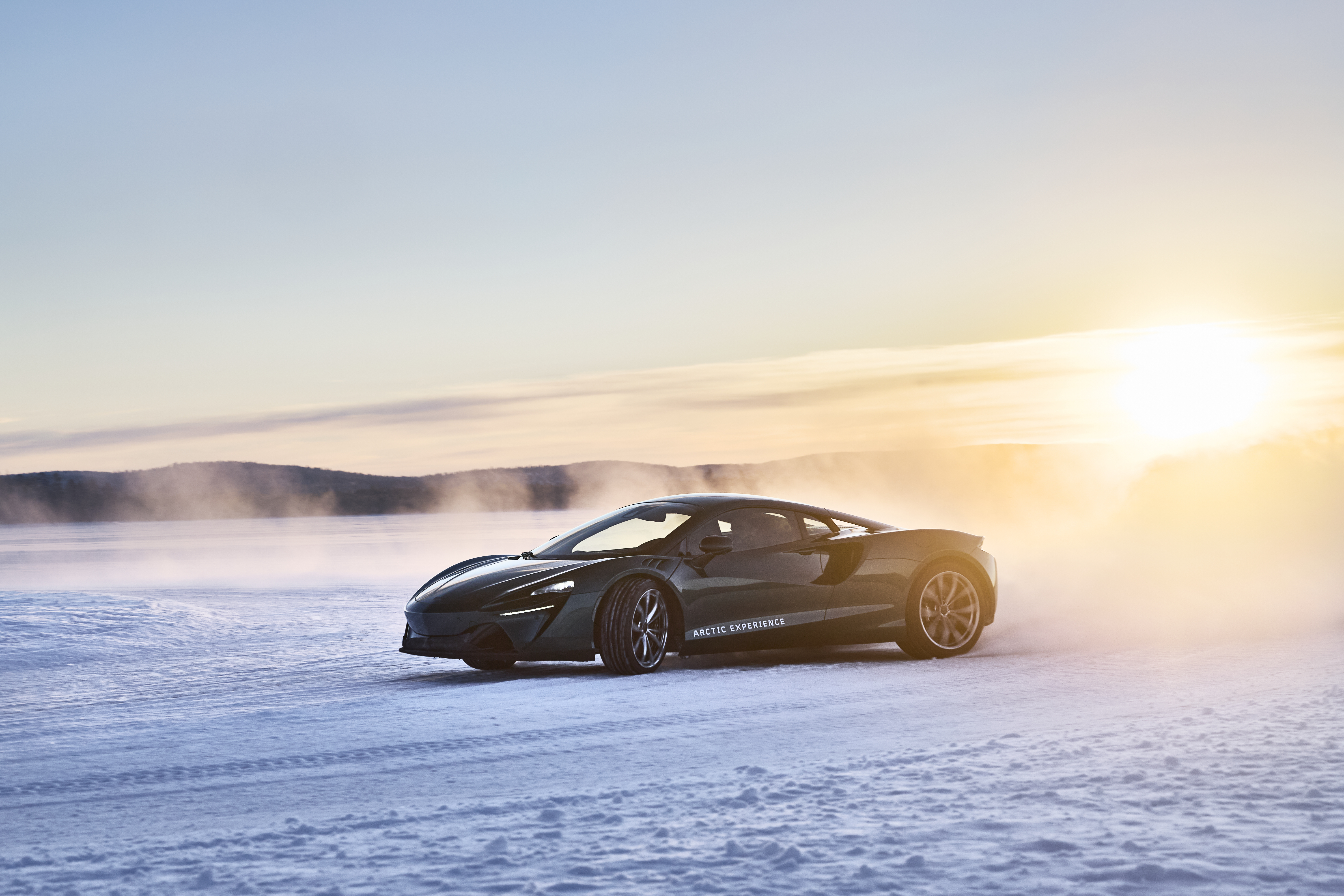 Images of a McLaren Artura going sideways on some ice