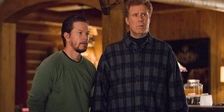 Daddy's Home 2 Mark Wahlberg and Will Ferrell look on in fright at something in their cabin