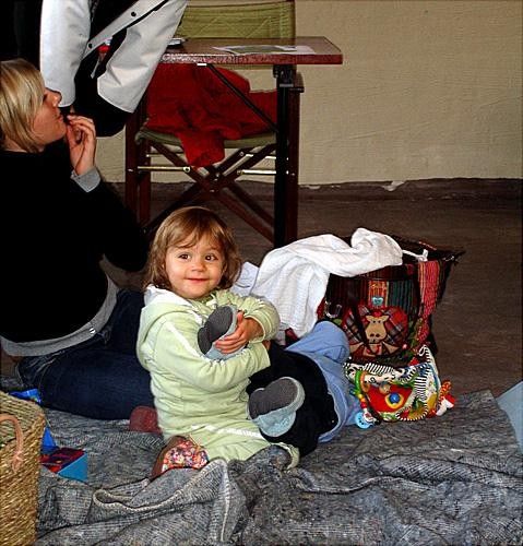 Andreas Riis (6 months) undergoing his own survival camp experience in the hands of Domitilla Basso!