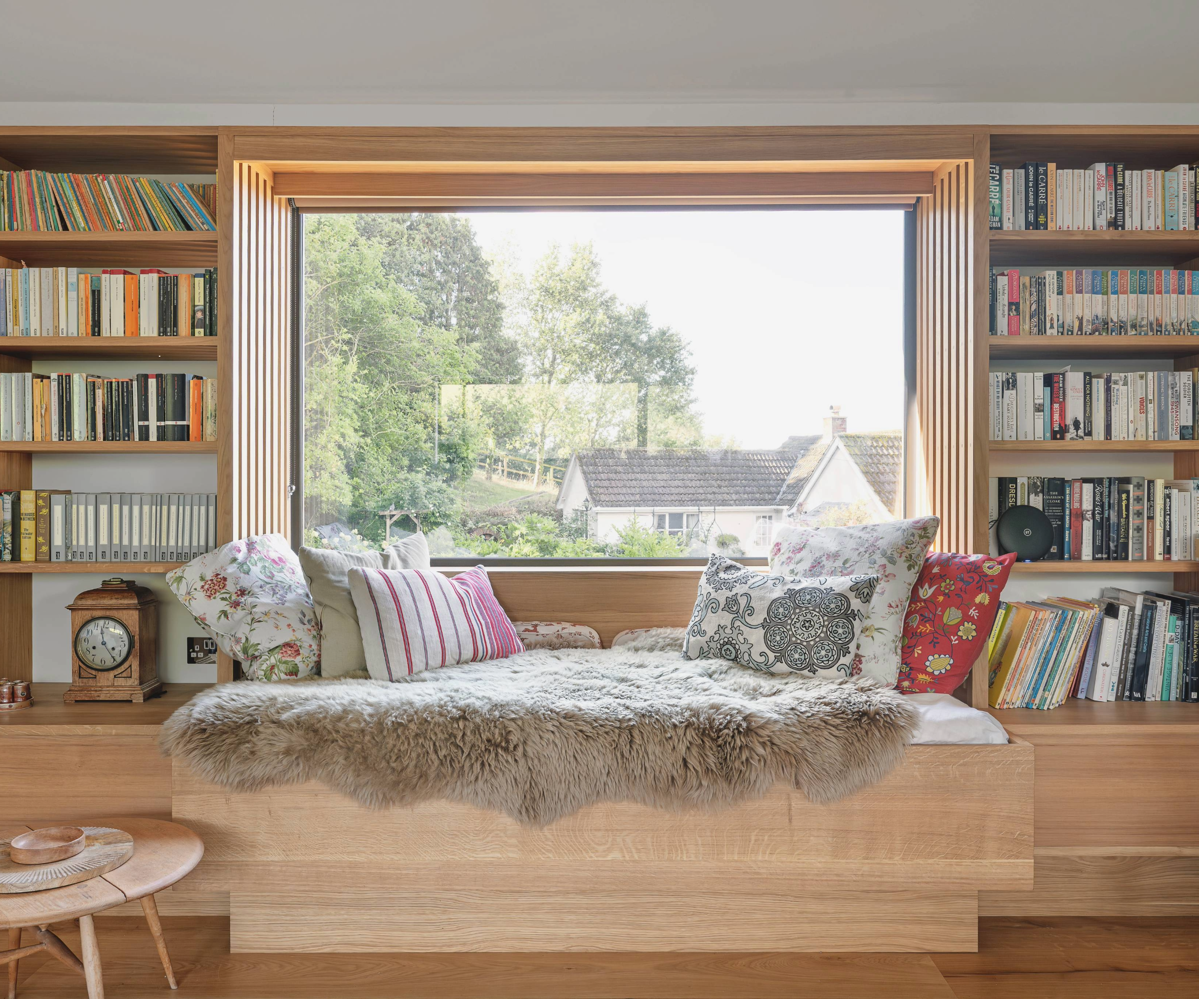 Window nook with book shelves either side