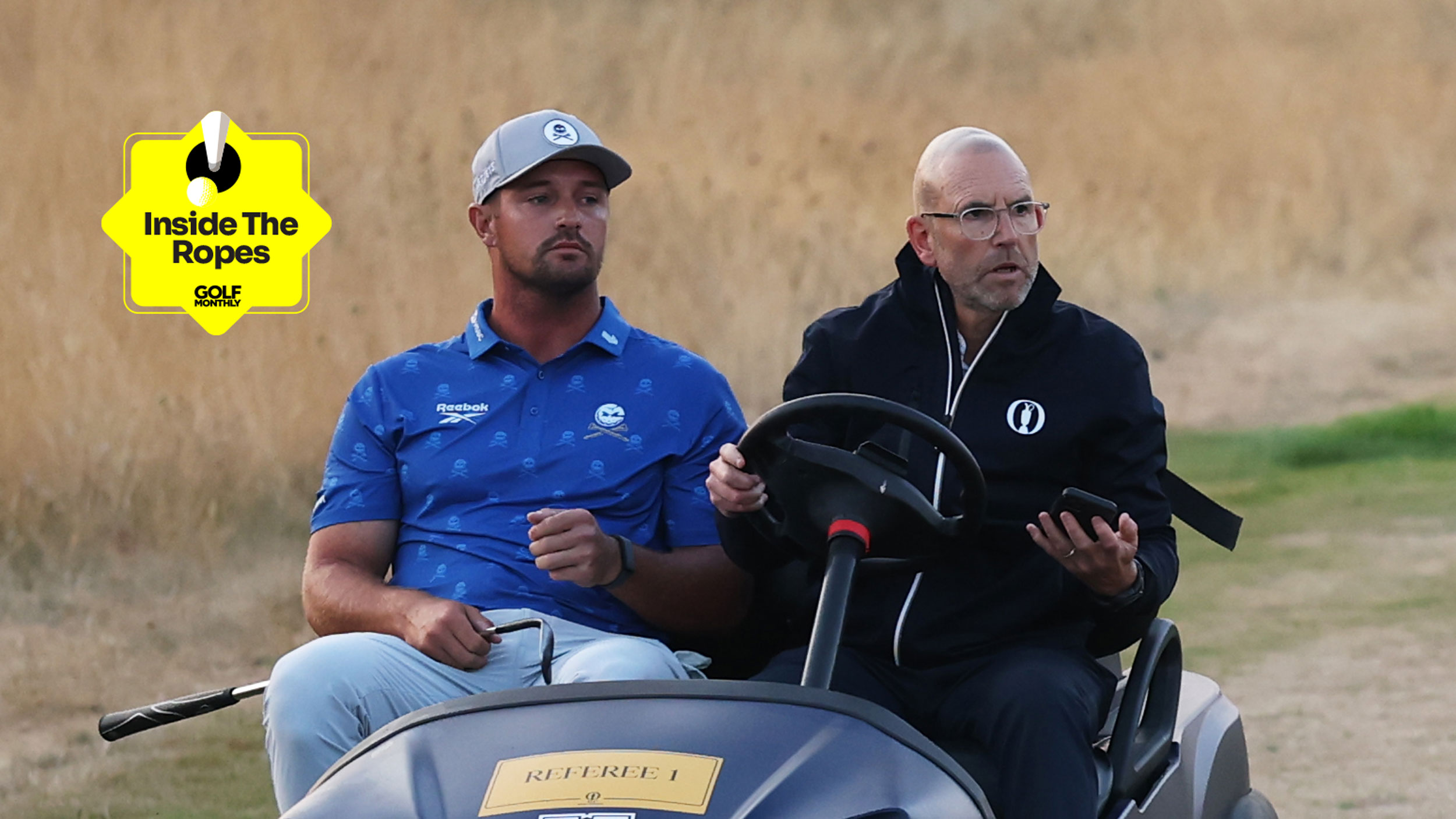 Bryson DeChambeau and R&amp;A rules official Grant Moir drive in a golf cart at Royal Birkdale in 2026
