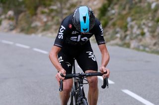 Chris Froome (Team Sky) looking at his stem