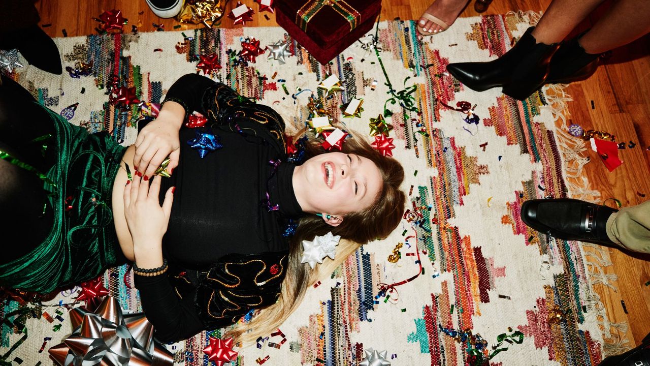 How to deal with FOMO: A woman at a Christmas party