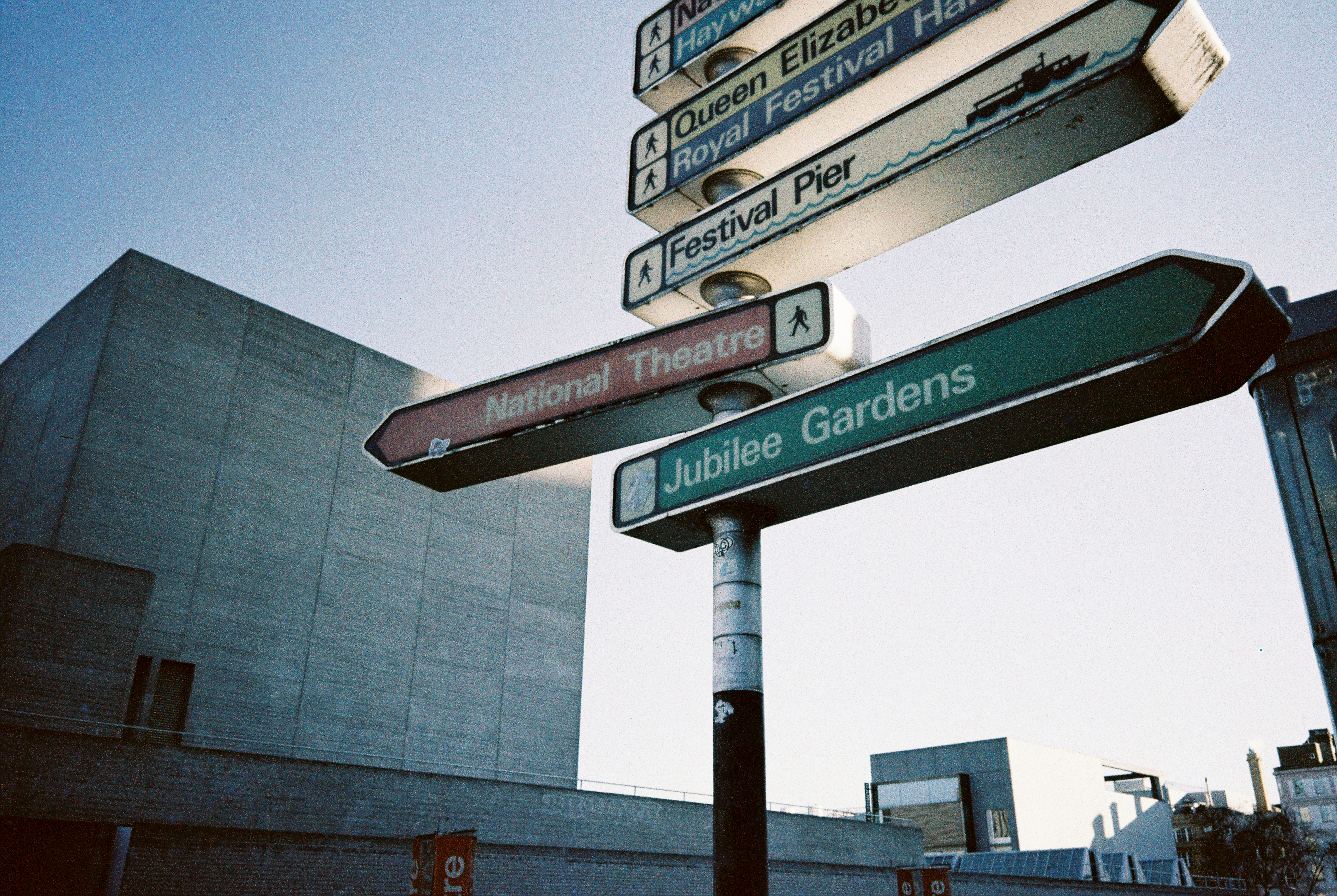 Sample photograph taken with Kodak Snapic A1 showing a sign pointing in multiple directions outside the National Theatre