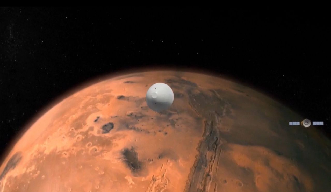 An artist's concept of China's first Mars rover mission, Tianwen-1, at the Red Planet.