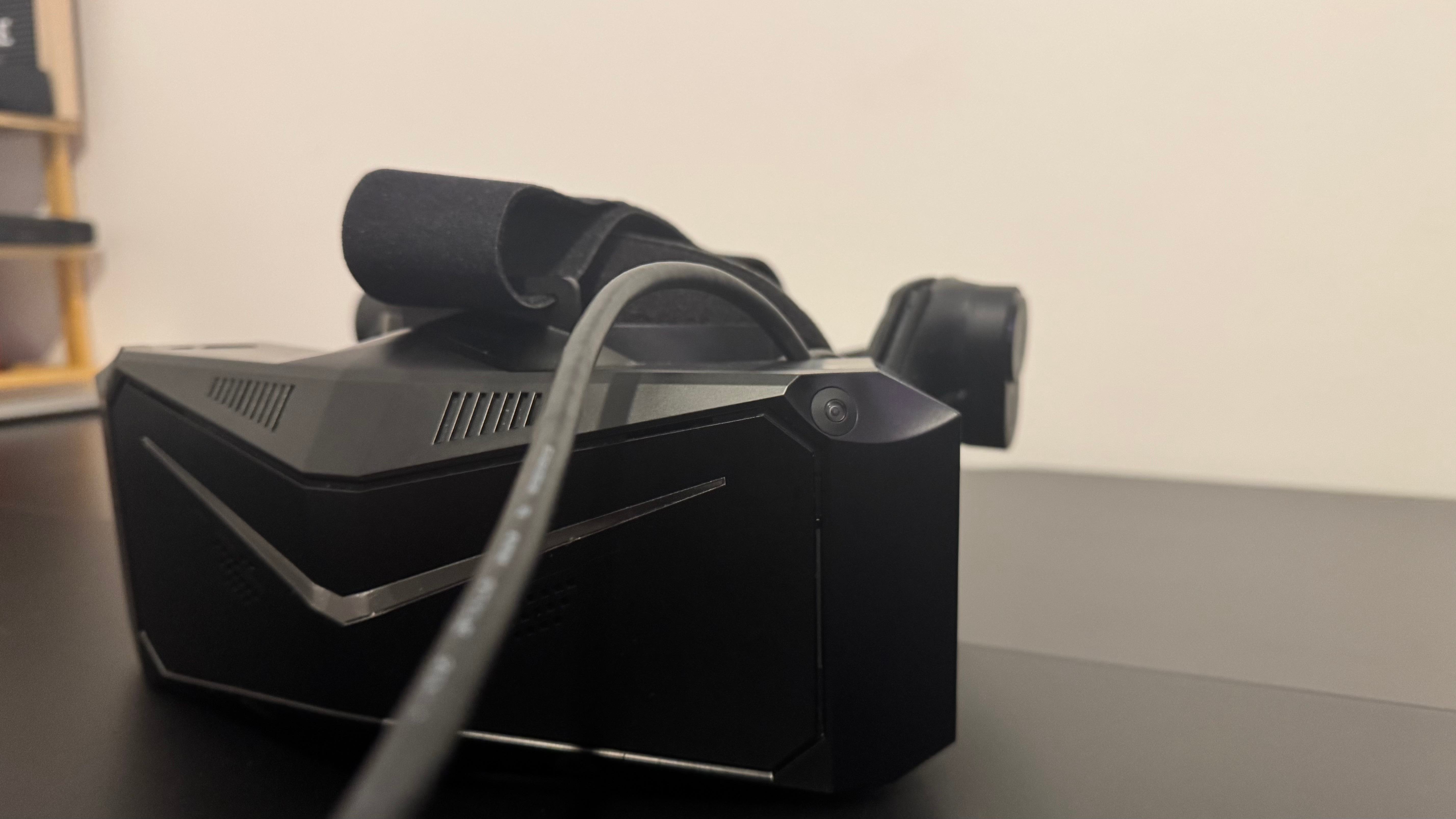 The Pimax Crystal Light VR headset on a table