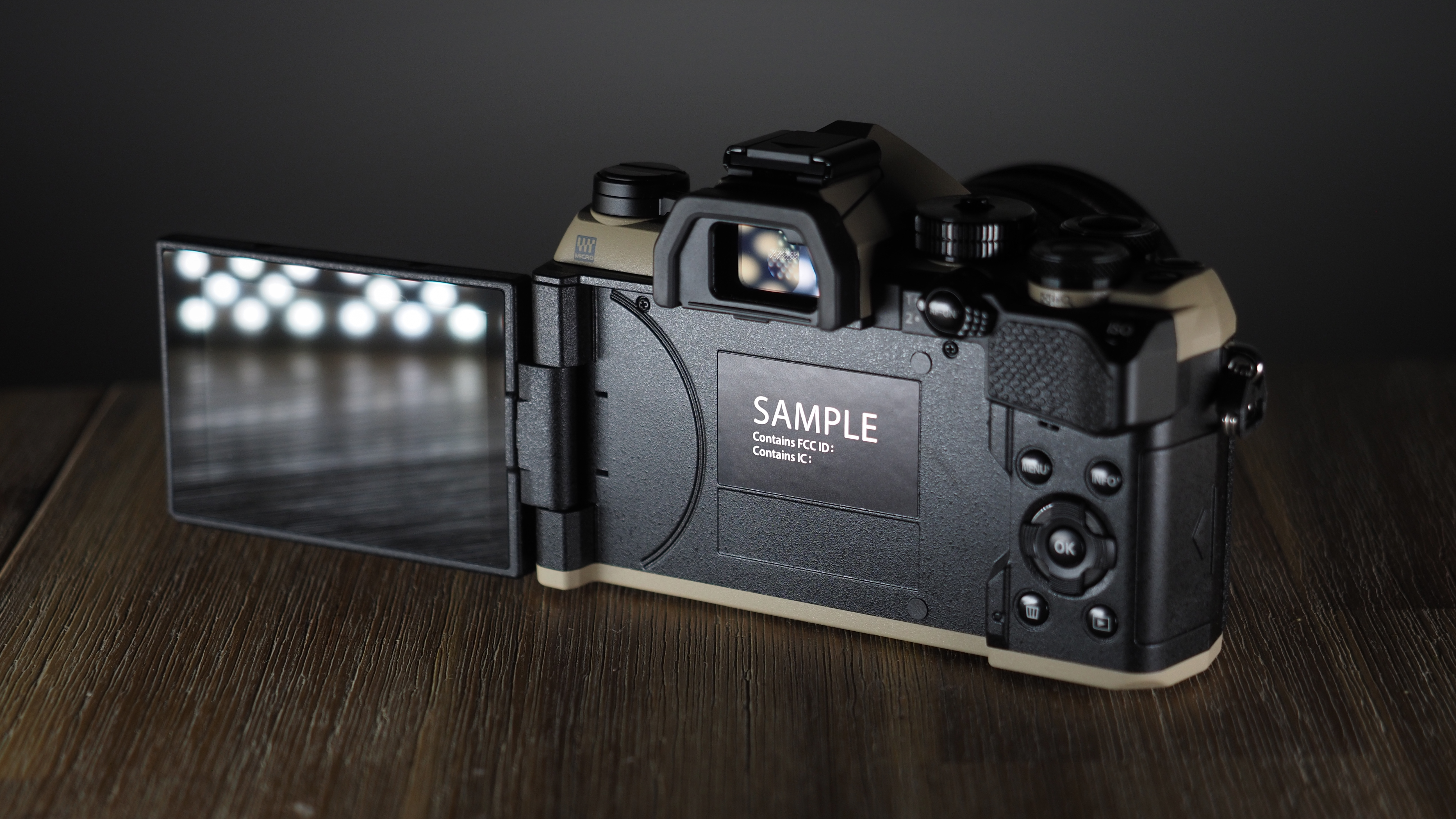 OM System OM-5 Mark II on a wooden surface