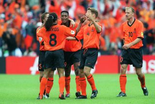 Patrick Kluivert celebrates with his Netherlands team-mates during a 6-1 win over Yugoslavia at Euro 2000.