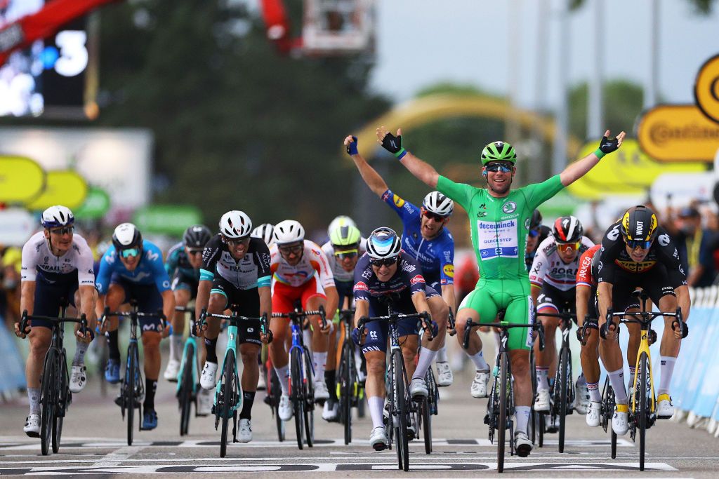 VALENCE FRANCE JULY 06 Mark Cavendish of The United Kingdom and Team Deceuninck QuickStep Green Points Jersey Green Points Jersey stage winner celebrates at arrival Wout Van Aert of Belgium and Team JumboVisma Jasper Philipsen of Belgium and Team AlpecinFenix Michael Matthews of Australia and Team BikeExchange Nacer Bouhanni of France and Team Arka Samsic during the 108th Tour de France 2021 Stage 10 a 1907km stage from Albertville to Valence LeTour TDF2021 on July 06 2021 in Valence France Photo by Tim de WaeleGetty Images