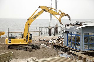 Many businesses constructed on or along the beach suffered irreparable damage. Demolition was required for those that were no longer structurally sound.