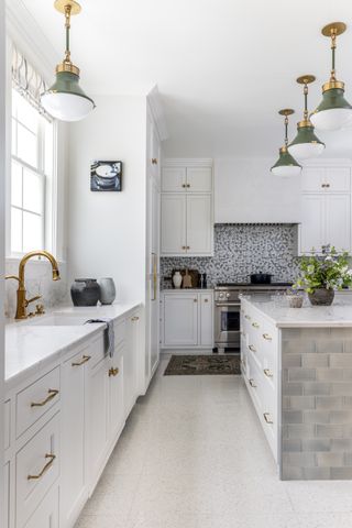 White kitchen with terrazzo kitchen flooring