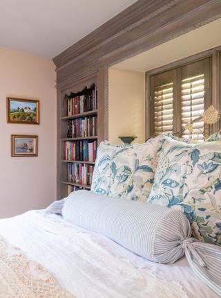 bedroom with built in bookshelf