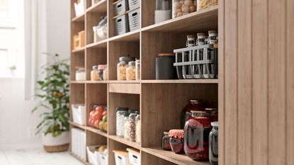 A wooden open shelf pantry