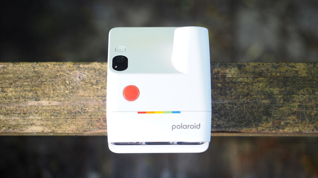 Polaroid Go Gen 3 on a wooden surface outdoors
