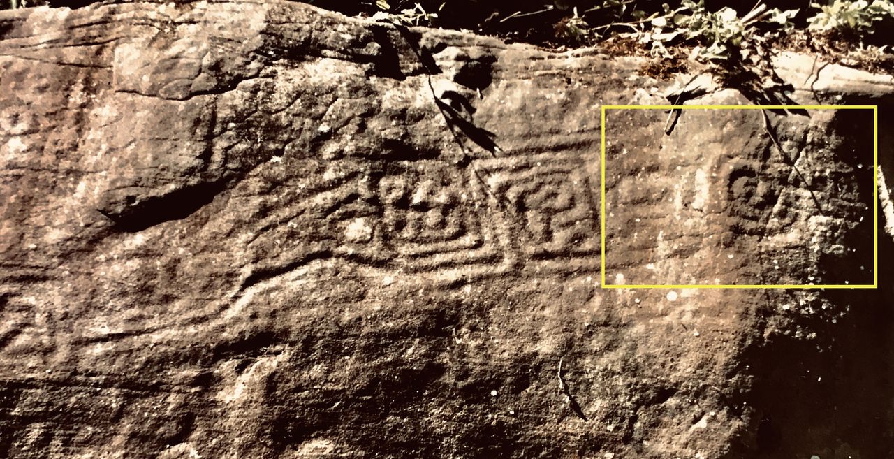 Another picture highlighting part of the monolith where the feline feathered figure is located.