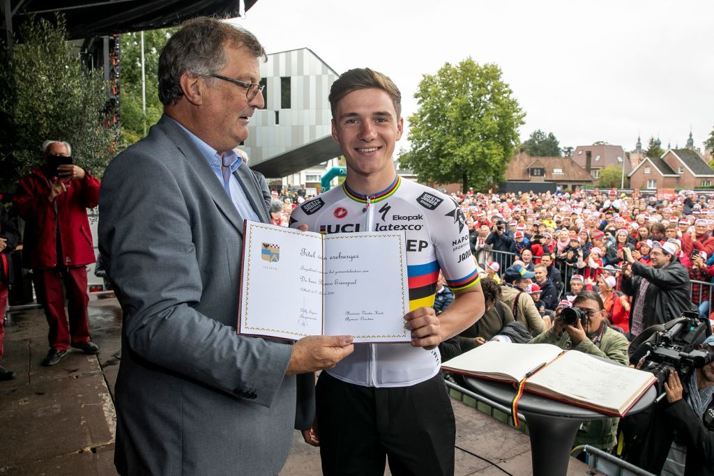 Belgian Remco Evenepoel receive the honorary citizen diploma from Dilbeek Mayor Wilfried Segers at the celebration of world champion Evenepoel in Dilbeek and start of a big bike ride to Brussels Sunday 02 October 2022 22 years old Evenepoel from Schepdael Dilbeek became world champion after a great season with a win at the Vuelta first Belgian in 44 years to win a big tour BELGA PHOTO HATIM KAGHAT Photo by HATIM KAGHAT BELGA MAG Belga via AFP Photo by HATIM KAGHATBELGA MAGAFP via Getty Images