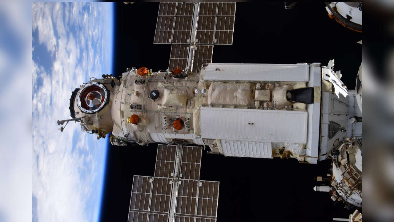 Nauka module in space with the earth on the left