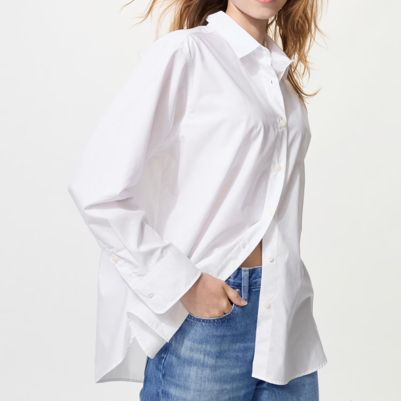 A model wearing a white shirt and jeans