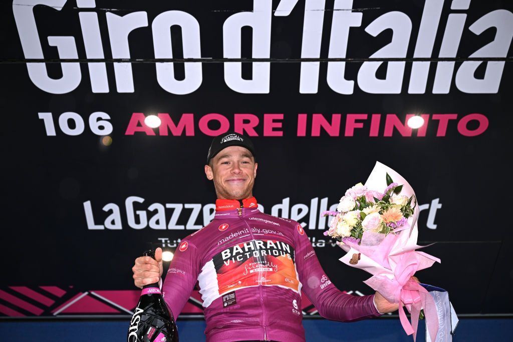CASSANO MAGNAGO ITALY MAY 20 Jonathan Milan of Italy and Team Bahrain Victorious celebrates at podium as Purple Points Jersey winner during the 106th Giro dItalia 2023 Stage 14 a 194km stage from Sierre to Cassano Magnago UCIWT on May 20 2023 in Cassano Magnago Italy Photo by Stuart FranklinGetty Images