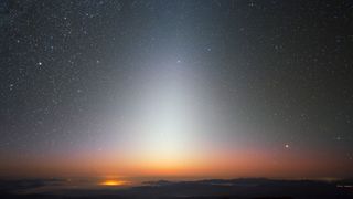 A photograph of the zodiacal light, a triangular glow seen best in night skies free of overpowering moonlight and light pollution.