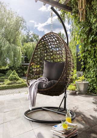 A cozy hanging chair sets the mood
