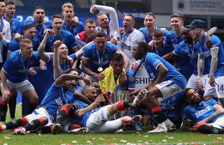 Rangers players celebrate their Scottish Premiership title win in May 2021.