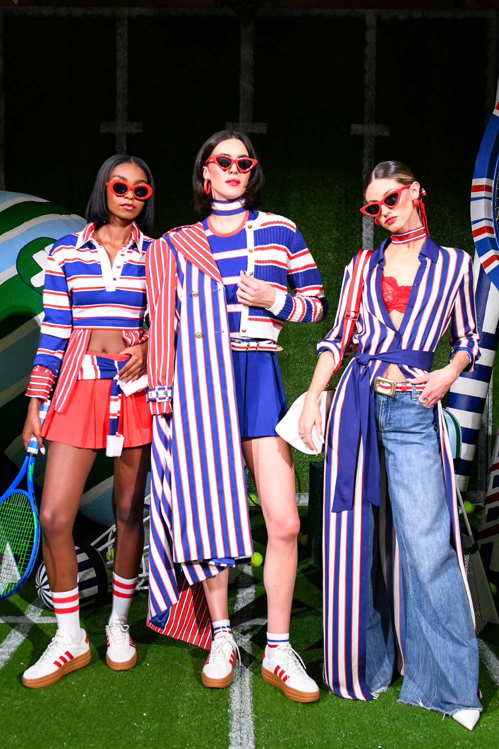Alice + Olivia NYFW ss26 presentation - three models in striped outfits