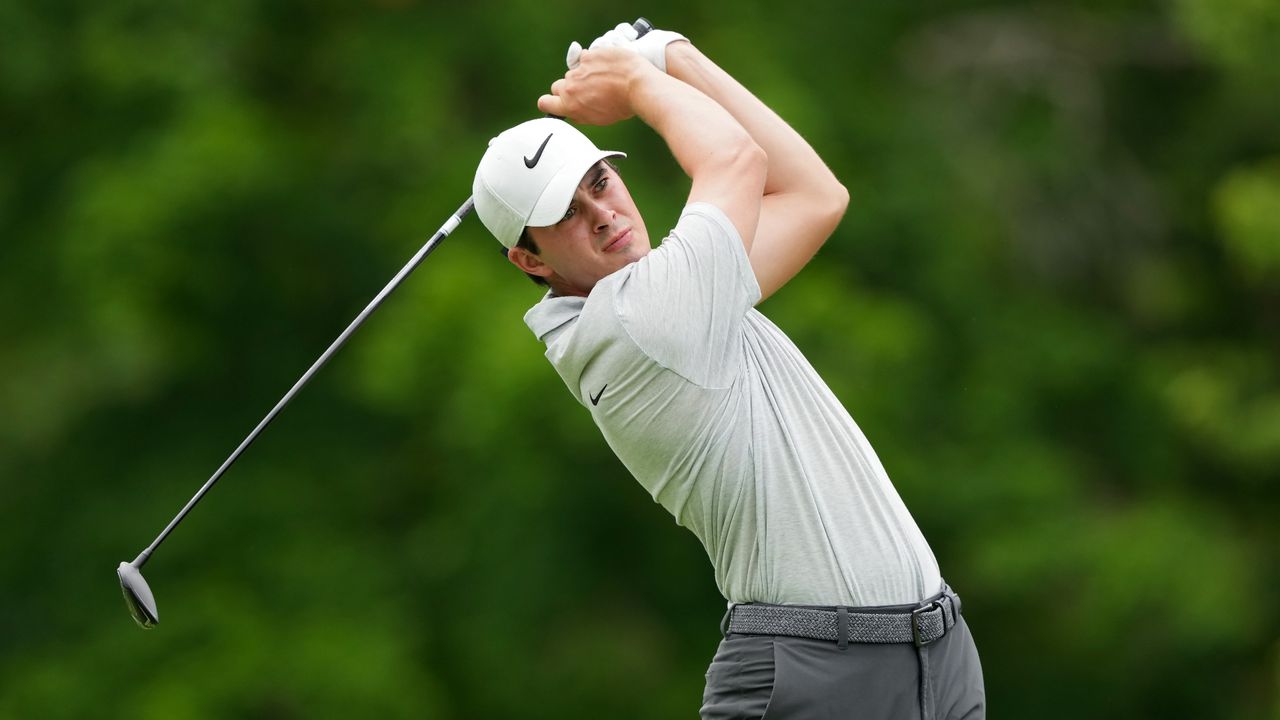 Davis Thompson of the United States plays his shot from the 18th tee during the third round of the Memorial Tournament presented by Workday at Muirfield Village Golf Club on June 08, 2024 in Dublin, Ohio.