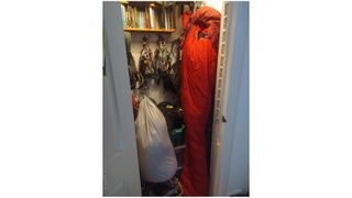 sleeping bag hanging in a cupboard