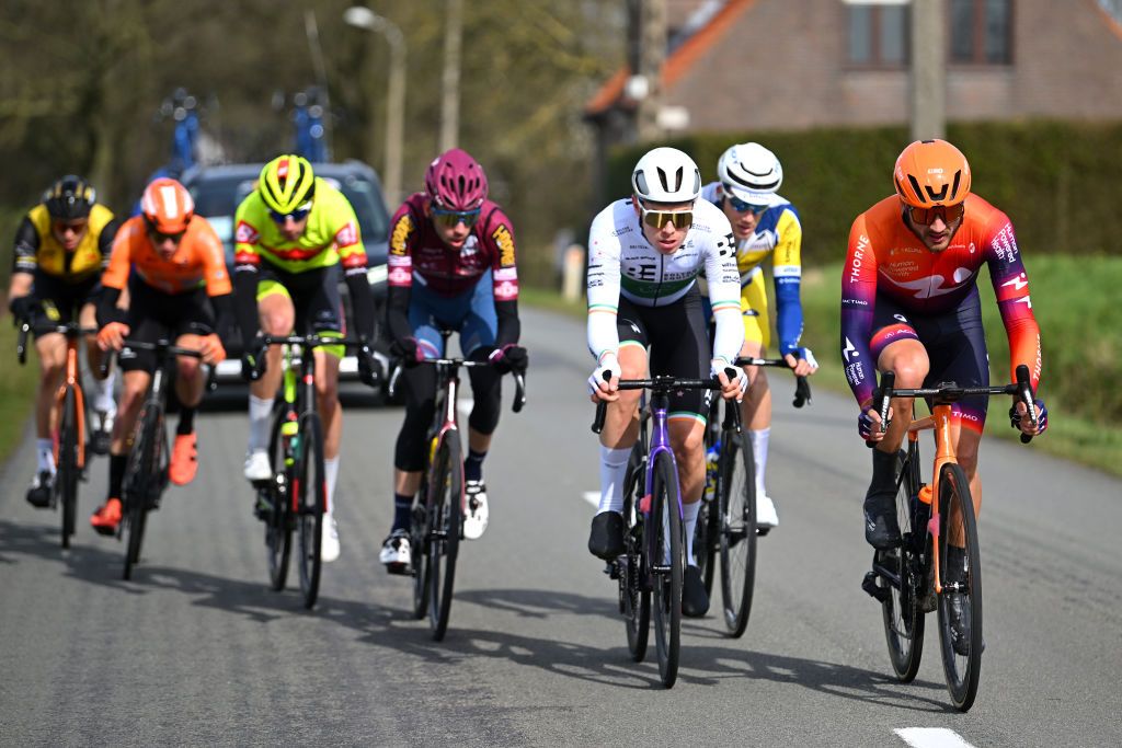 DEINZE BELGIUM MARCH 15 LR Rory Townsend of Ireland and Team Bolton Equities Black Spoke and Adam De Vos of Canada and Team Human Powered Health compete in the breakaway during the 77th Danilith Nokere Koerse 2023 Mens Elite a 1936km one day race from Deinze to Nokere DanilithNokereKoerse on March 15 2023 in Deinze Belgium Photo by Luc ClaessenGetty Images