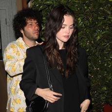 Selena Gomez wore an all-black matching set with leather T-strap Proenza Schouler sandals.