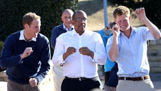Prince William and Prince Harry dance with Prince Seeiso in Lesotho