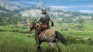 best single-player games: Arthur on his horse overlooking a large meadow