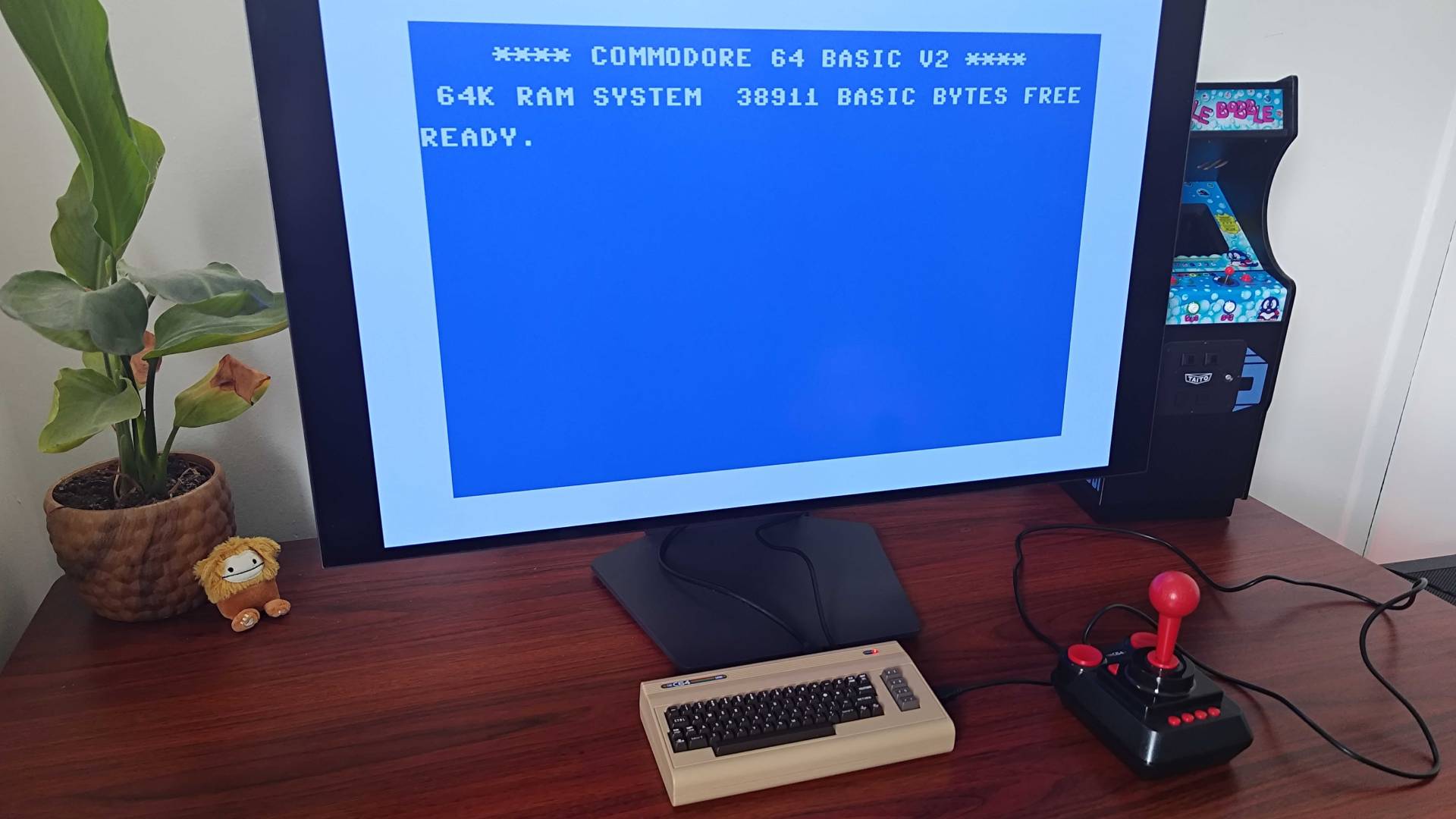 C64 Mini connected to monitor with Commodore Basic blue screen displayed.