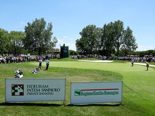 Players putting on the green at the Italian Open