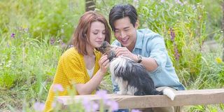 Henry Lau and Kathryn Prescott in A Dog's Journey