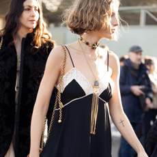 woman wearing a choker necklace