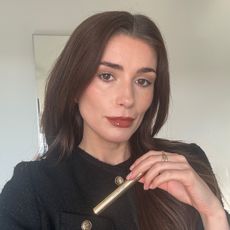 Eleanor wearing Hourglass Phantom Volumizing Glossy Balm in shade Trace