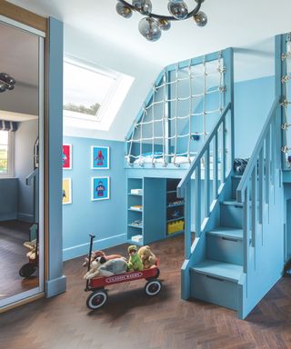 children's playroom with built in bunk bed painted blue