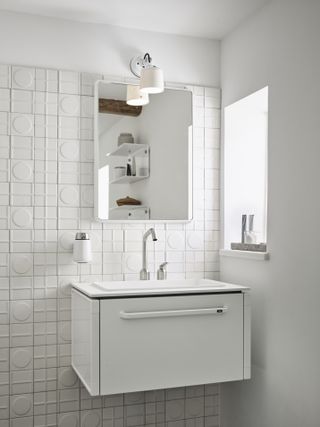 white bathroom tile with basin