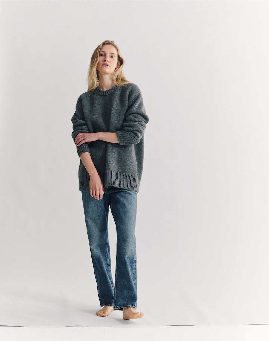 a model wearing a jumper from navygrey