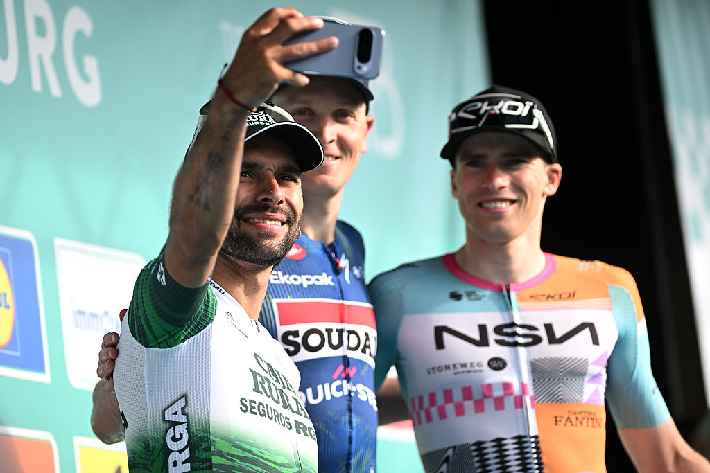TONGEREN, BELGIUM - APRIL 15: (L-R) Fernando Gaviria of Colombia and Team Caja Rural - Seguros RGA on second place, race winner Tim Merlier of Belgium and Team Soudal Quick-Step and Floris Van Tricht of Belgium and NSN Development Team on third place pose and take a selfie on the podium ceremony after the 10th Ronde Van Limburg 2026 a 178.4km one day race from Hasselt to Tongeren on April 15, 2026 in Tongeren, Belgium. (Photo by Luc Claessen/Getty Images)