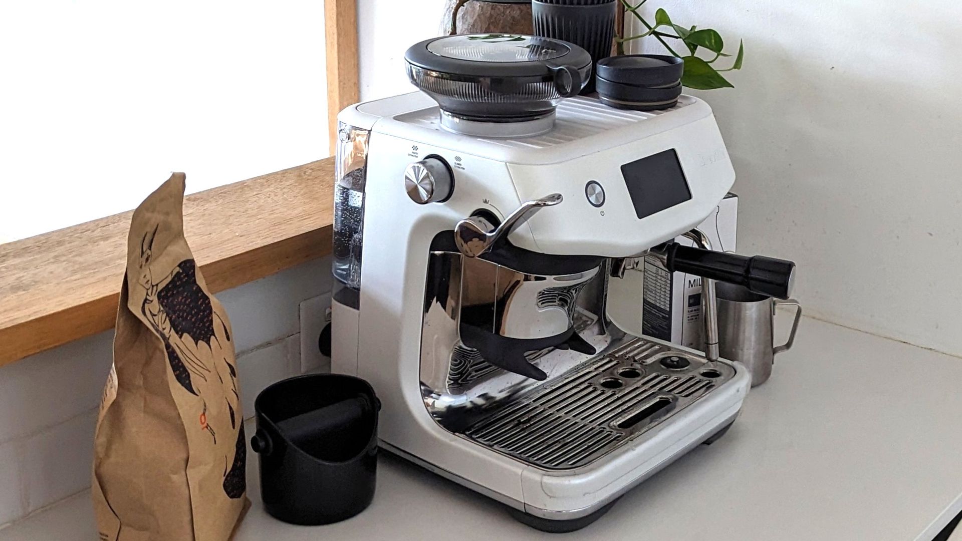 Breville Barista Touch coffee maker on kitchen counter