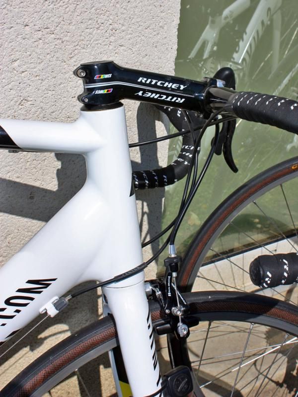 Canyon's relatively long head tubes find many Omega Pharma-Lotto team riders on aggressively angled stems and no spacers.