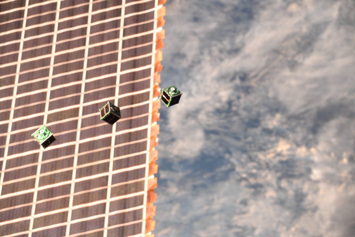 The three Cubesats being released into low Earth orbit