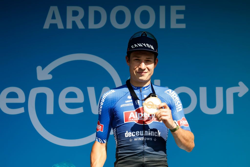 ARDOOIE BELGIUM AUGUST 23 Jasper Philipsen of Belgium and Team AlpecinDeceuninck celebrates at podium as stage winner during the 19th Renewi Tour 2023 Stage 1 a 1829km stage from Blankenberge to Ardooie on August 23 2023 in Ardooie Belgium Photo by Bas CzerwinskiGetty Images