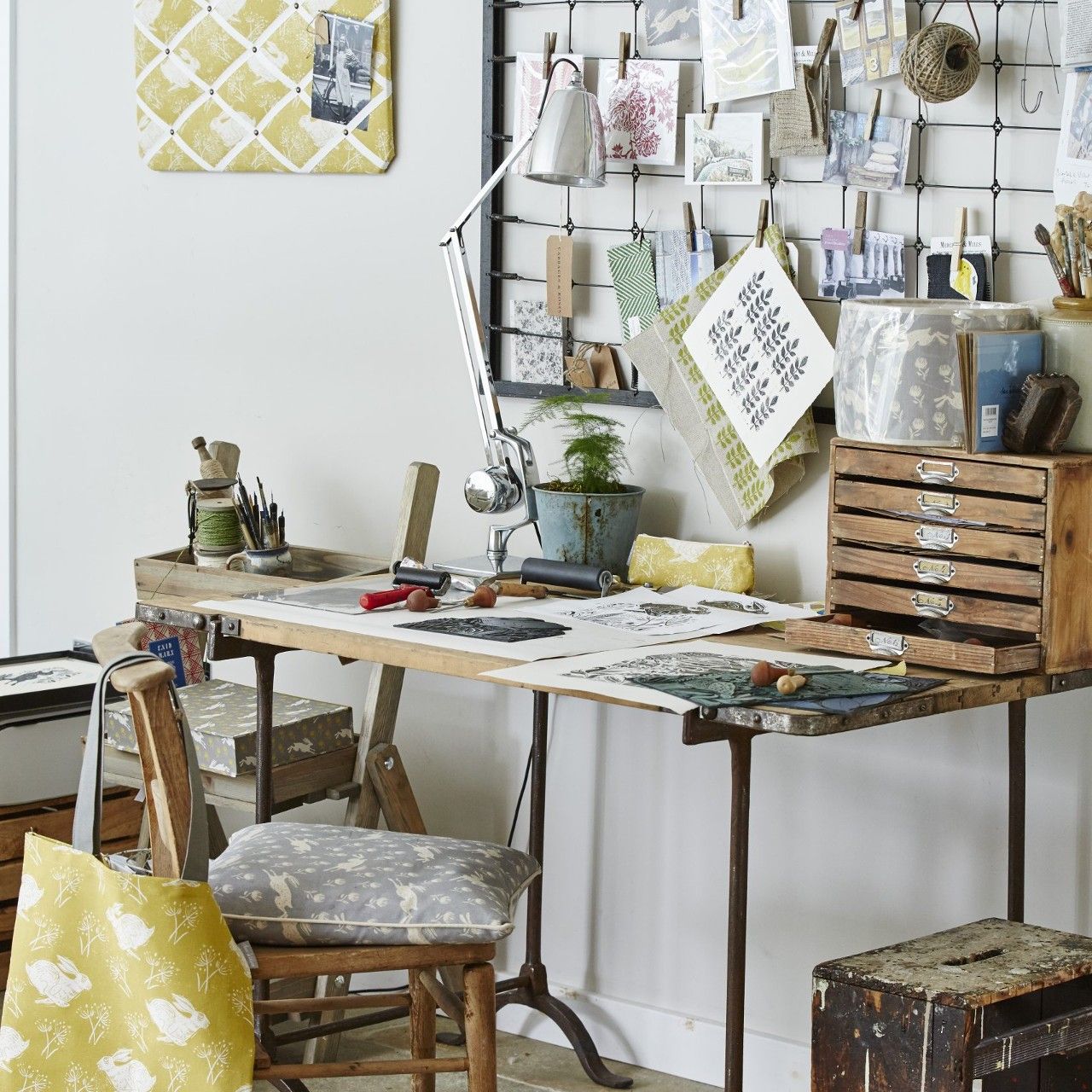 white wall with photo grill work desk and chair