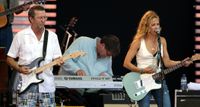 Eric Clapton and Sheryl Crow perform live together at the 2007 Crossroads festival, with Slowhand playing his signature Strat, Crow playing a Telecaster.
