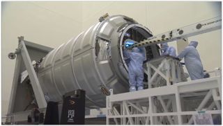 Cygnus supply spacecraft loaded in clean room